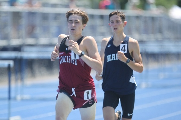 Two male track runners